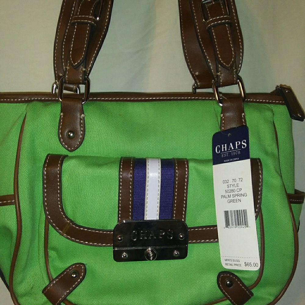 Green chaps purse with tags still on it.